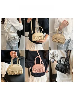 Detail view of stylish pleated handbag showing various colors and elegant crossbody options