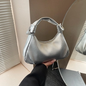 Silver metallic pleated pea handbag with crescent shape and knotted handle detail