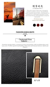 Detail shot of black litchi texture faux leather handbag with gold metal hardware