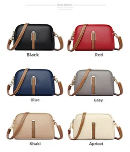 Six colorful shell-shaped crossbody bags in pebbled leather with gold metal clasps