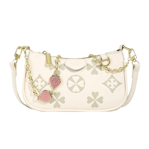 Beige embossed clover crossbody bag with gold chain strap and strawberry charms