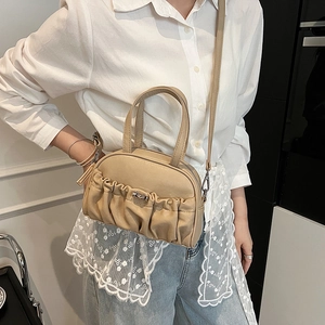 Fashionable beige pleated leather crossbody handbag with elegant metal lock for women