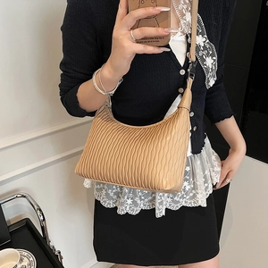 French vintage beige pleated hobo shoulder bag with adjustable strap and silver buckle