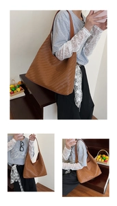 Detailed view of brown woven texture and vegan leather strap on a large hobo tote bag