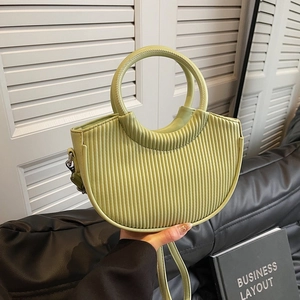 Pistachio green pleated crescent handbag with circular handles for women fashion