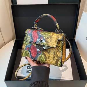 Chic multi-color snakeskin textured Kelly bag with metallic twist lock and top handle