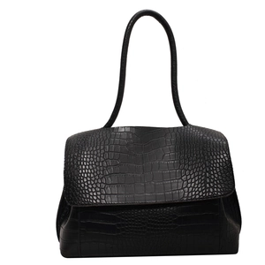Black crocodile embossed leather tote bag with long shoulder straps and flap closure