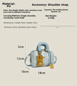Detailed size specifications of the light blue Boston handbag with chain and strap