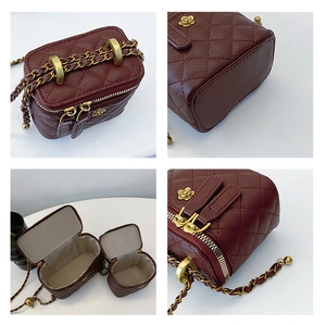 Detailed views of burgundy quilted leather bucket bag with chain strap and gold hardware