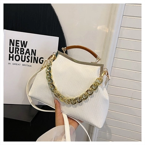 White woven textured doctor bag with wood handle and gold rhinestone chain detail
