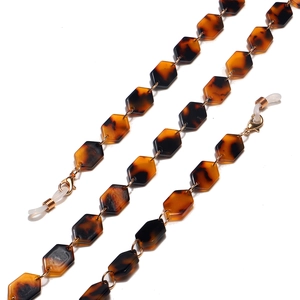 Fashion acrylic tortoiseshell glasses chain with golden rings and silicone loop ends
