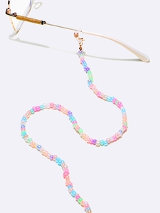 Detail of colorful macaron beaded eyeglass chain with gold metal adjusters and silicone loops