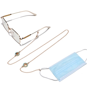 Golden eyewear chain with turquoise crown charms and non-slip rubber loop connectors