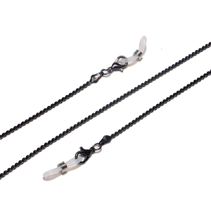 Detail of black thin metal chain featuring lobster clasps and clear silicone loops