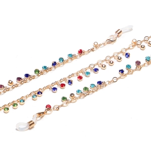 Catenina per occhiali fatta a mano con strass colorati e maglie dorate