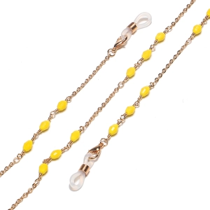 Handmade golden eyewear chain with yellow faceted beads and clear anti-slip loops