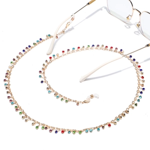 Catena per occhiali dorata alla moda con strass colorati e passanti in gomma regolabili