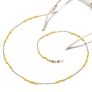 Handmade golden eyewear chain with bright yellow crystal beads and adjustable silicone loops