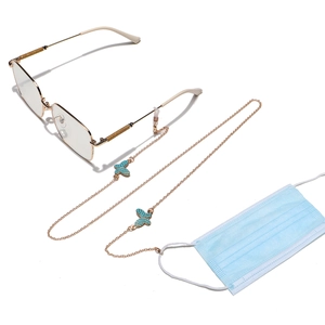 Chaîne de lunettes dorée élégante avec papillon turquoise et crochets antidérapants