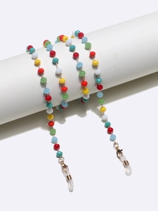 Detail of colorful crystal beaded eyeglass chain with gold links and non-slip loops