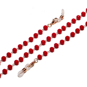 Detailed view of red faceted beads and gold lobster clasp for non-slip eyewear chain