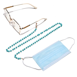 Detail of turquoise beaded glasses chain with adjustable silicone loops and metal hooks