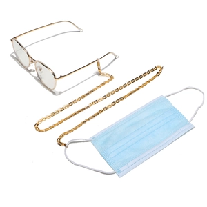 Golden rectangular link chain used as a stylish eyewear strap and face mask holder
