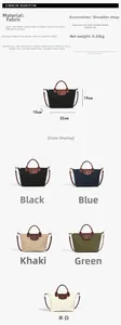 Detail view of the oxford tote bag showing dimensions and adjustable shoulder strap