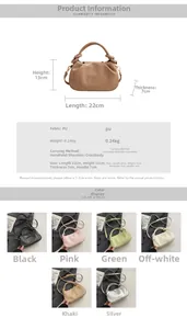 Detail view of ruched bucket bag with PU leather texture and removable shoulder strap