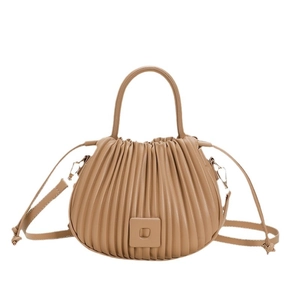 Khaki pleated bucket bag with top handles and adjustable strap for women in 2025 fashion