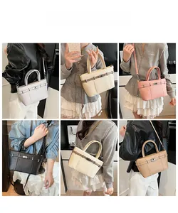 Sacs cabas motif litchi en six couleurs avec forme trapèze et fermoir rotatif métallique