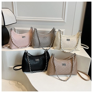 Detailed collection of pleated half-moon bags with metal chain straps and twist locks