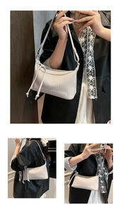 Detailed views of beige crossbody bag featuring vertical quilted pleats and knotted zipper
