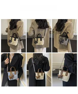 Multiple views of mini bucket bags featuring canvas texture and cute dog charm details