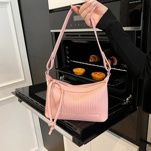 Chic pink underarm bag for women with vertical pleats and stylish side knot detail