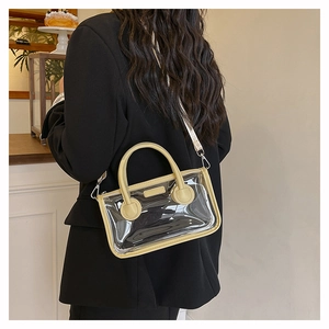Moderne transparente PVC-Gel-Tasche mit gelber Lederverzierung und schmalem Gurt