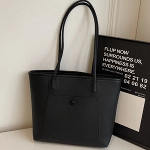 Large black litchi pattern faux leather tote bag with shoulder straps and front pocket