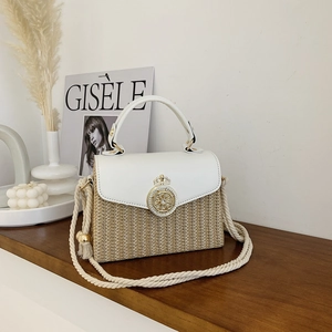Minimalist straw woven square box bag with leather trim and cotton rope shoulder strap
