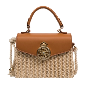 Straw mini box bag with brown leather trim and crown lock for crossbody wear