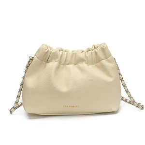 Minimalist creamy white lychee textured cloud bag with elegant silver chain strap