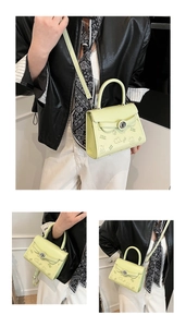 Detailed views of the light green square bag with cute bear prints and metal twist lock