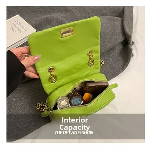 Detailed internal capacity view of a bright green quilted chain bag for daily essentials
