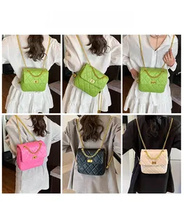 Detailed view of quilted crossbody bag colors and metallic chain straps on models