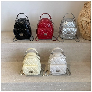 Five mini quilted backpacks with chain straps in black, red, silver, beige and white