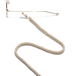 Minimalist beige braided cotton eyewear strap with gold hooks on white background