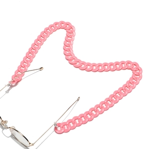 Detail of bright pink acrylic eyeglass chain with secure silicone loops and flat links