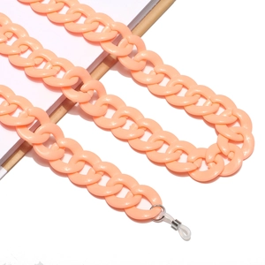 Detail of pink resin acrylic eyewear chain with adjustable silicone anti-slip loops