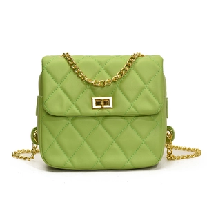 Chic lime green quilted shoulder bag with gold chain strap and elegant metal turn lock