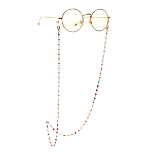 Handmade golden chain for glasses featuring colorful rhinestones and transparent beads