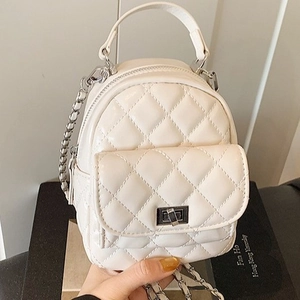 White quilted PU leather mini backpack with chain strap and top handle for women